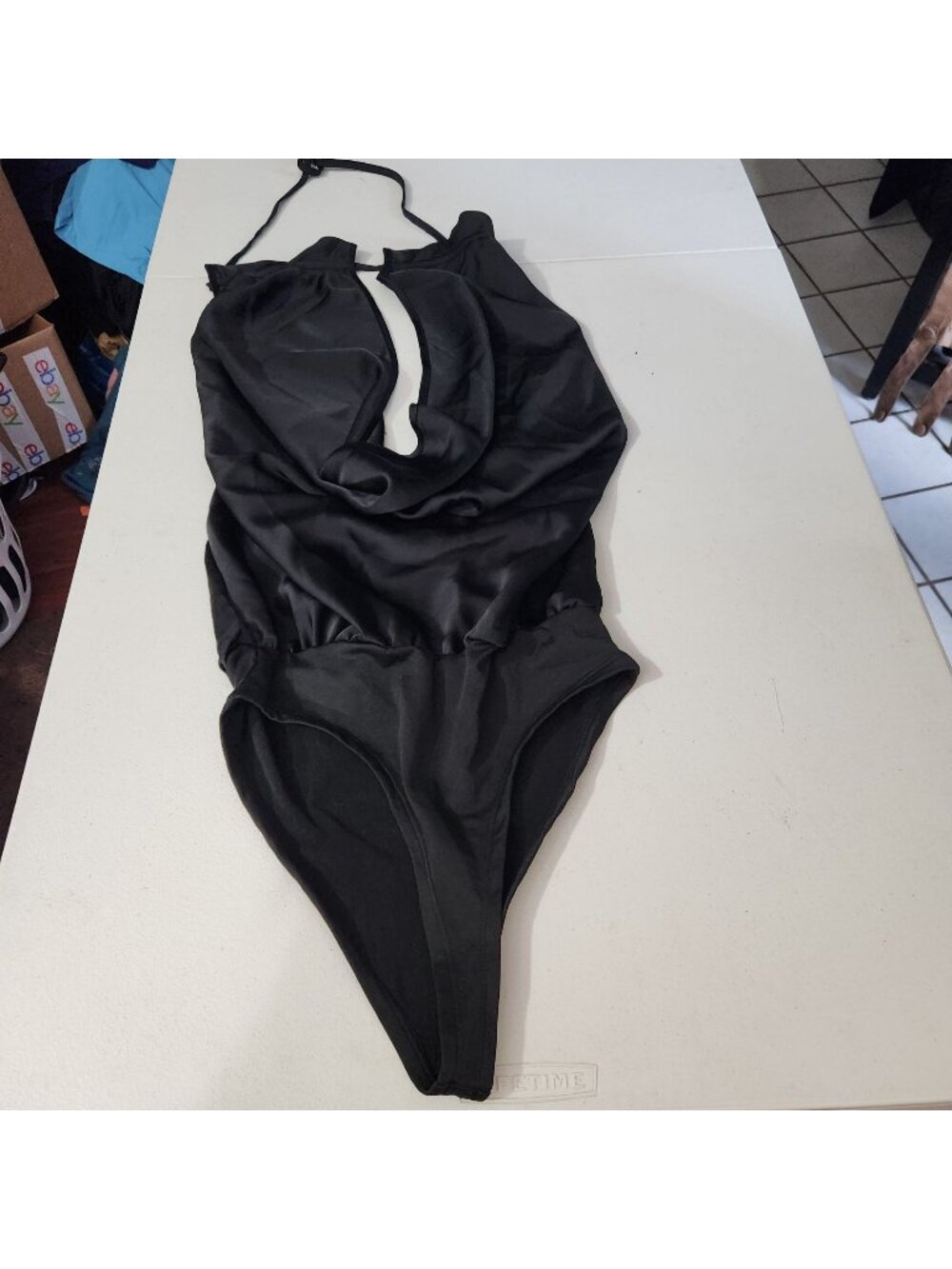 Micas One-Piece Body Suit Womens Swimsuit Size S Black Cutout Halter Solid Luxur